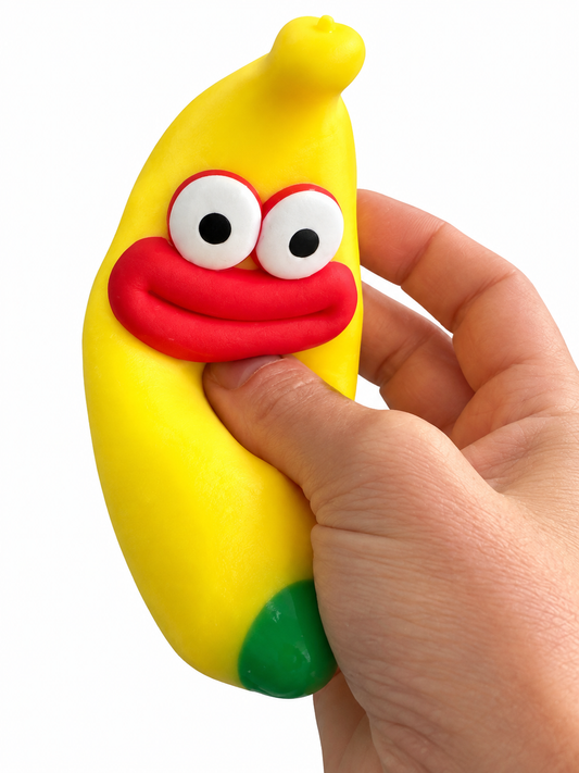 Crunchy Emoji Banana Squishy-290 Home/Gift- Simply Simpson's Boutique is a Women's Online Fashion Boutique Located in Jupiter, Florida