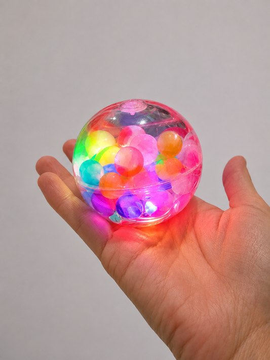 FLASHING Bouncing Water Ball with Water Beads-290 Home/Gift- Simply Simpson's Boutique is a Women's Online Fashion Boutique Located in Jupiter, Florida