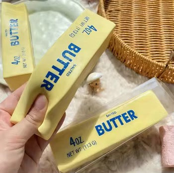 Butter Squishy Toy- Simply Simpson's Boutique is a Women's Online Fashion Boutique Located in Jupiter, Florida