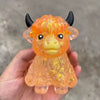 Highland Cow Glitter Squish Toy-290 Home/Gift- Simply Simpson's Boutique is a Women's Online Fashion Boutique Located in Jupiter, Florida