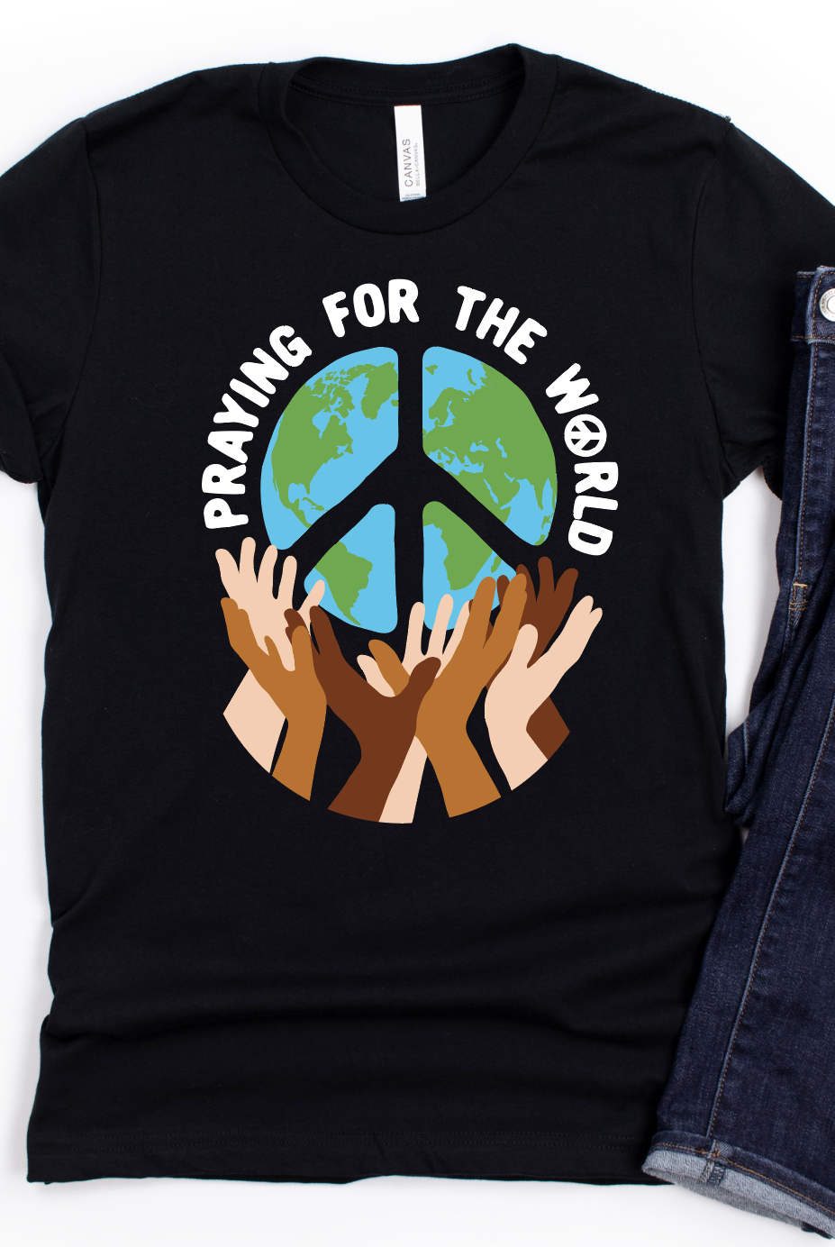Praying For The World-Graphic Tee- Simply Simpson's Boutique is a Women's Online Fashion Boutique Located in Jupiter, Florida