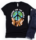 Praying For The World-Graphic Tee- Simply Simpson's Boutique is a Women's Online Fashion Boutique Located in Jupiter, Florida