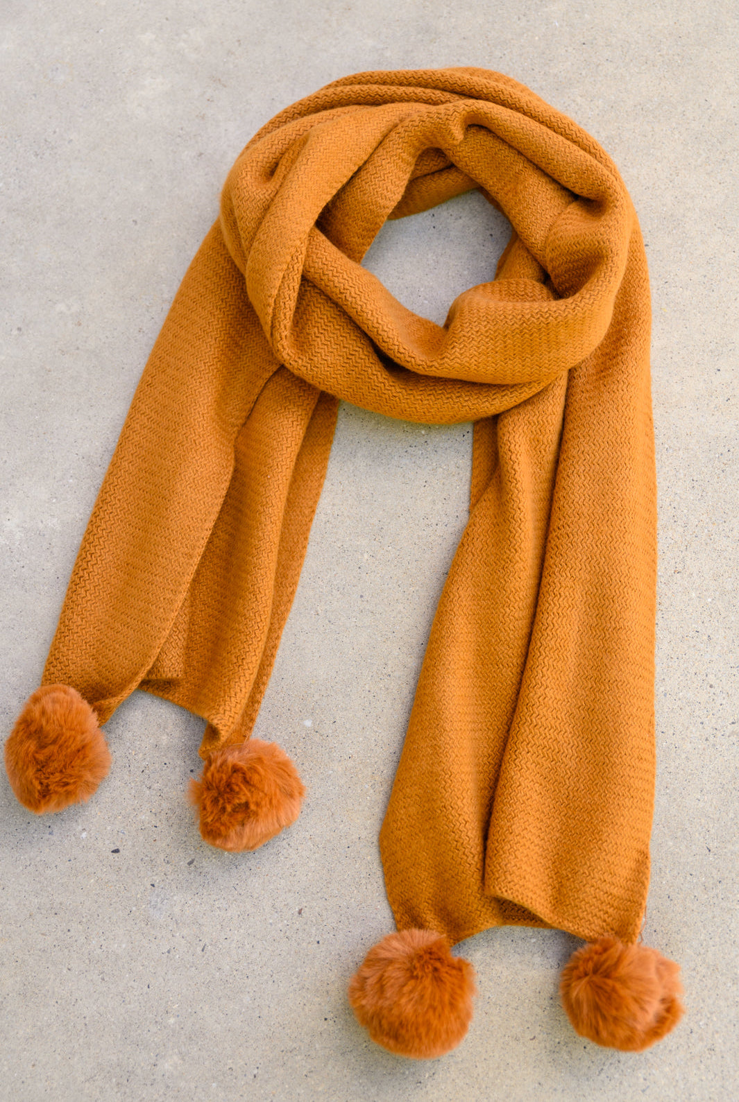 Knitted Fuzzy Pom Pom Scarf In Ginger-Accessories- Simply Simpson's Boutique is a Women's Online Fashion Boutique Located in Jupiter, Florida