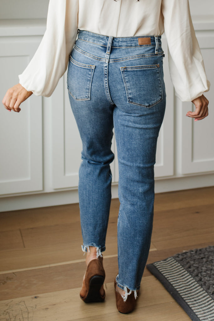 Midrise Destructed Hem Slim Fit-Jeans- Simply Simpson's Boutique is a Women's Online Fashion Boutique Located in Jupiter, Florida