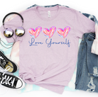 Love Yourself-Graphic Tee- Simply Simpson's Boutique is a Women's Online Fashion Boutique Located in Jupiter, Florida