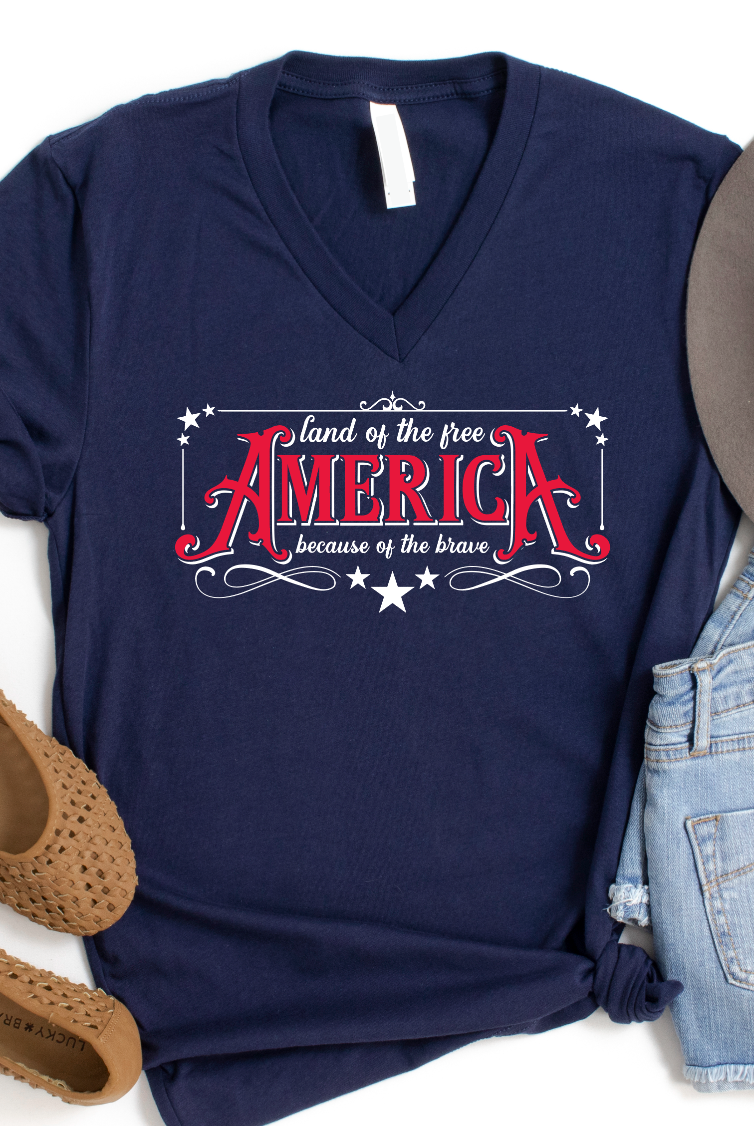America... Land of the FREE-Graphic Tee- Simply Simpson's Boutique is a Women's Online Fashion Boutique Located in Jupiter, Florida