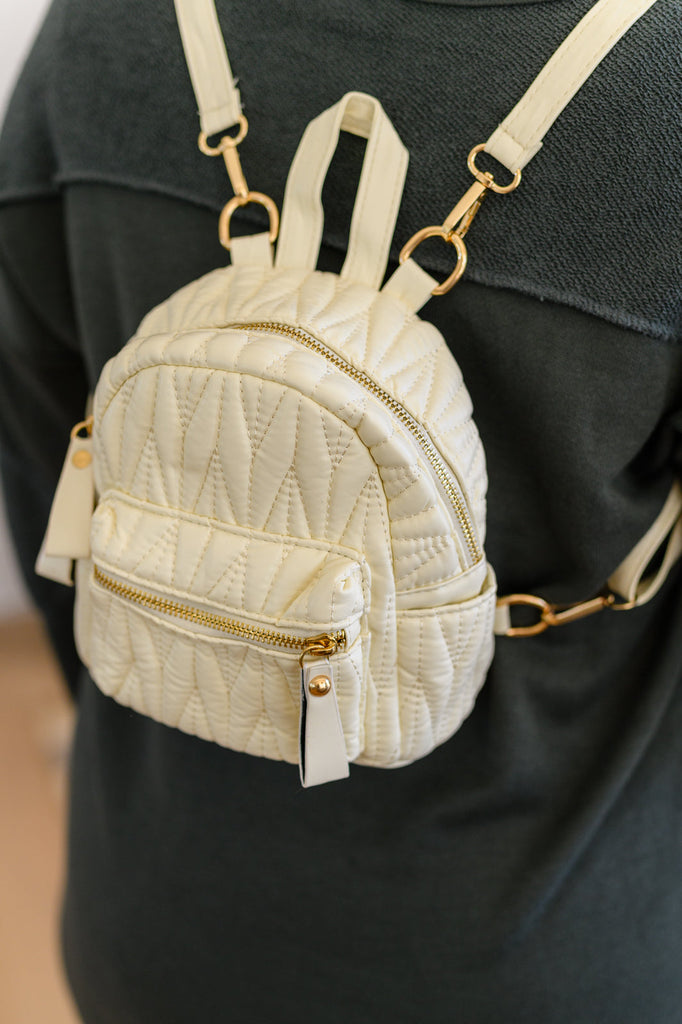 Take It With You Quilted Mini Backpack in Cream-Accessories- Simply Simpson's Boutique is a Women's Online Fashion Boutique Located in Jupiter, Florida